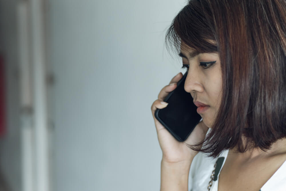 stressed person on phone