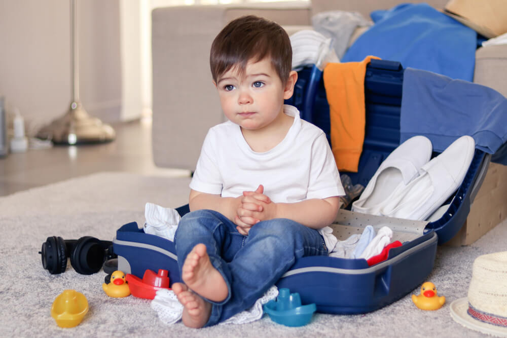 young child in alternative accommodation after a fire