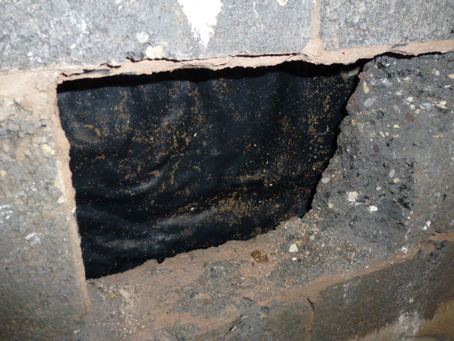 Domestic wall cavity exposed for specialist structural drying after flood damage