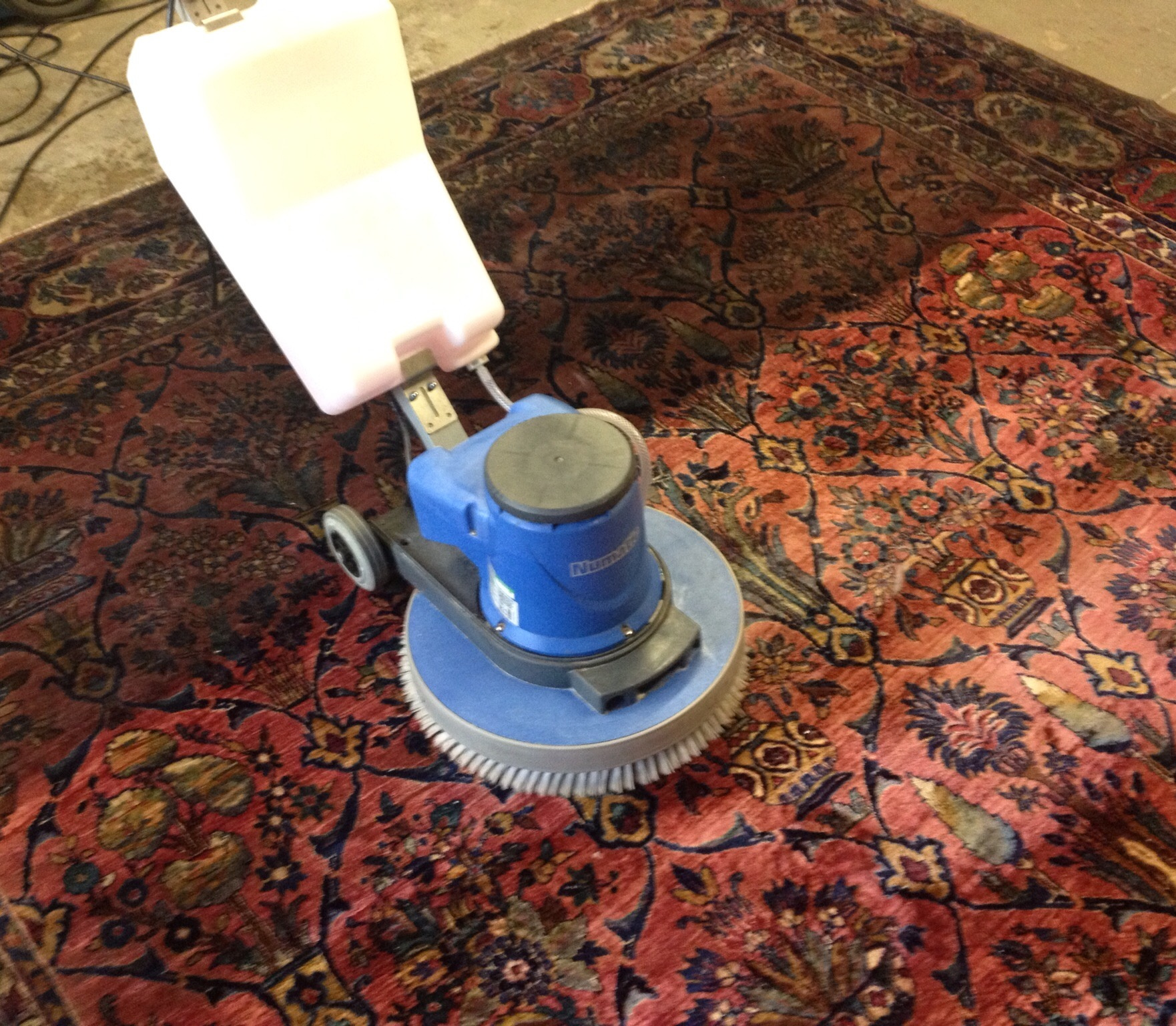 Specialist cleaning of a valuable patterned rug following fire and smoke damage